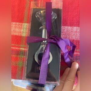 Faux diamond bottle opener. New in box. Super cute & Would make a great gift